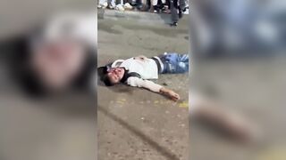 Captured Phone Thief Gets Kicked In The Head By Angry Mob