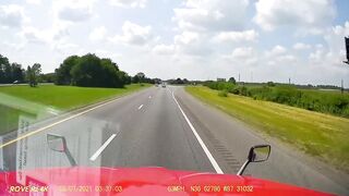 Guy commits suicide by jumping off an overpass onto a semi truck