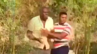 Old Man Takes A Rock To The Head During Stone Fight In Dominican Republic