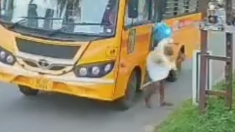 Elderly man seriously injured after being hit by a school bus