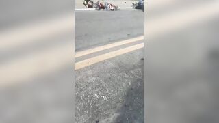 Motorcyclist Suffers Gruesome Injuries Lying Next to His Lifeless Friend