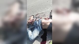 Motorcyclist Suffers Gruesome Injuries Lying Next to His Lifeless Friend