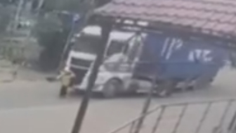 Old Woman Crossing The Road In Front Of The Truck Gets Crushed To Death