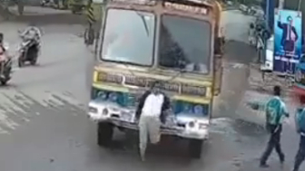 Truck Hits Woman Walking on Road, Leaves Her Injured