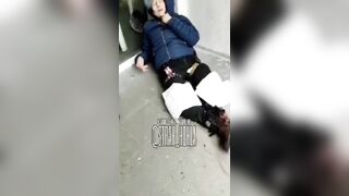 Ukr Nazi woman crying over her foot.