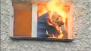Classic: Suicidal guy lights himself on fire before throwing himself out of window