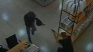 Mattress Store Owner Shoots Armed Robber Three Times Killing Him