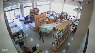Mattress Store Owner Shoots Armed Robber Three Times Killing Him