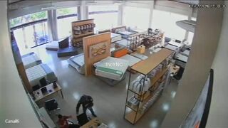 Mattress Store Owner Shoots Armed Robber Three Times Killing Him