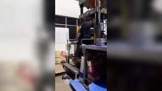 Worker`s Palms Flattened By Machine