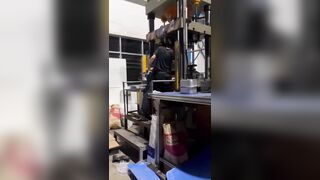 Worker`s Palms Flattened By Machine