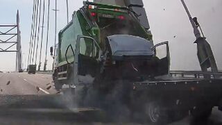 Collision Between Tow Truck And Garbage Truck Leaves On Dead