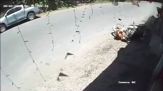 Woman Parking Her Motorcycle Gets Hit By Speeding Vehicle