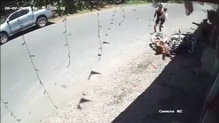 Woman Parking Her Motorcycle Gets Hit By Speeding Vehicle