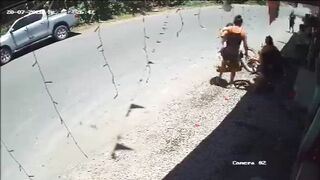 Woman Parking Her Motorcycle Gets Hit By Speeding Vehicle