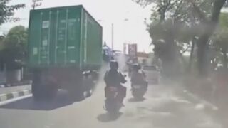 Truck Tire Bursts Hitting Elderly Couple on Motorcyclist