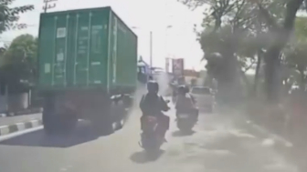 Truck Tire Bursts Hitting Elderly Couple on Motorcycle