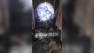 Dugout full of dead pedoruzzian invaders that requred gasmask to go in