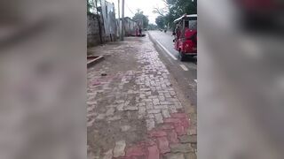 Man Seen Dragging Woman Clinging To His Motorcycle