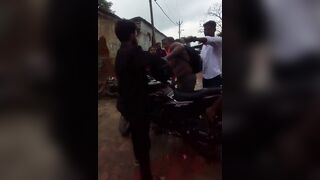 Man Seen Dragging Woman Clinging To His Motorcycle