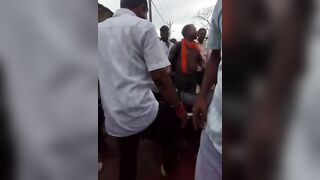Man Seen Dragging Woman Clinging To His Motorcycle