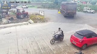 Woman Standing In The Middle Of The Busy Road Gets Run Over By Truck
