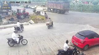 Woman Standing In The Middle Of The Busy Road Gets Run Over By Truck