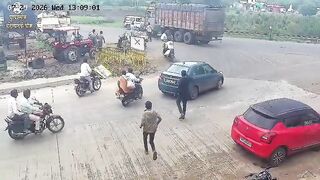 Woman Standing In The Middle Of The Busy Road Gets Run Over By Truck