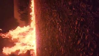 (REPOST)Three criminals burned alive for stealing car