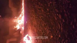 (REPOST)Three criminals burned alive for stealing car