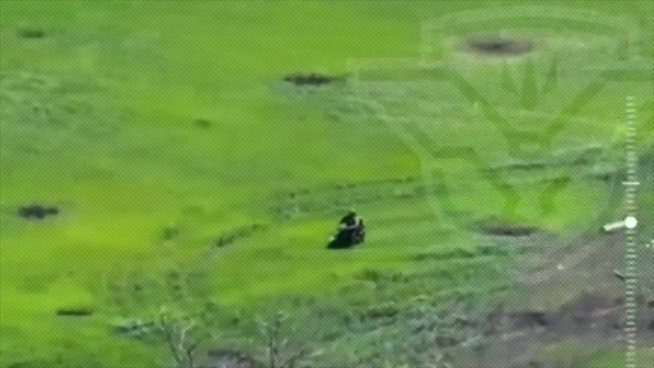 Russian motorcyclist soilder drives over mine.