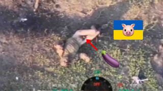 Ukr subhuman loses his arm and pants.