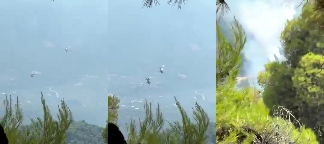 Two killed after firefighting helicopters collide in Greece.
