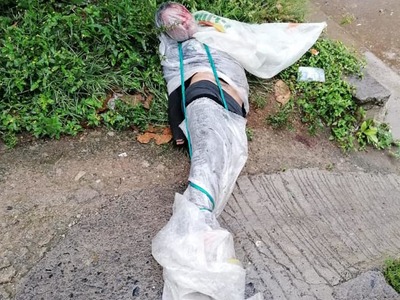 Female gang member found wrapped in plastic 