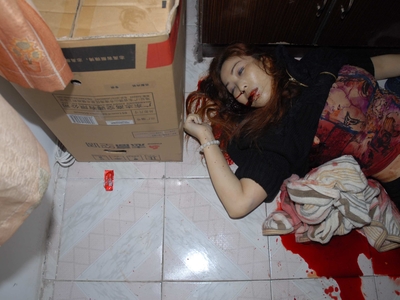 Prostitute found dead in room (examined)