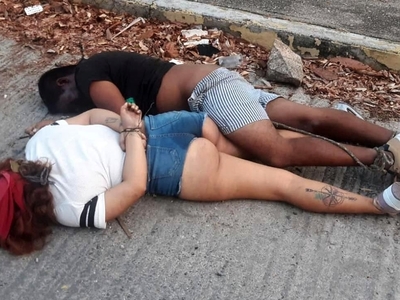 Young Couple Found Garroted in the Street
