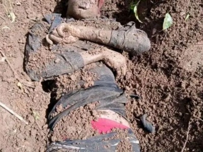 Black African woman killed and buried in a shallow grave