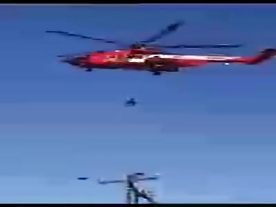 77 year old woman falls from helicopter while being rescued!