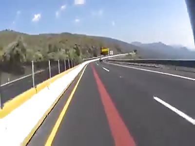 Motorcycle crashes on the road.