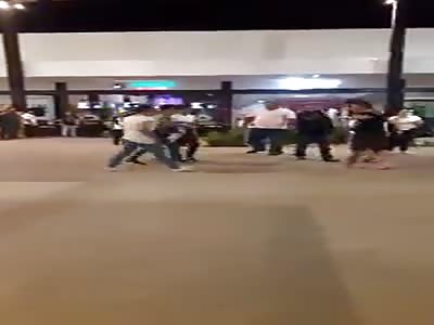 Fight outside the stadium. Yucatan, Mexico.