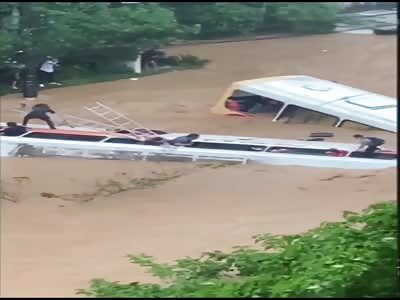 Two full coaches caught in severe flooding.
