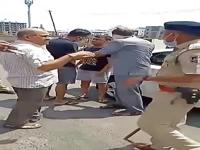 police officer attacks beaten people 