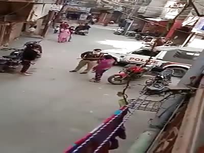 indian lady police beating girl