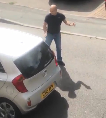 Shocking Moment 'Road Rage' Driver Sends Pedestrian Flying Over Hedge
