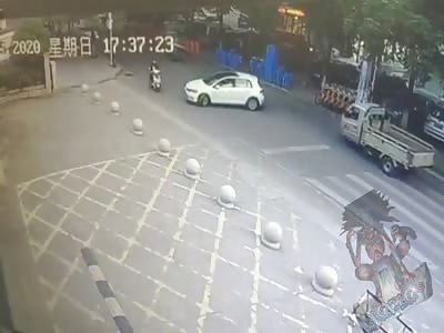 Man on scooter hit by a car