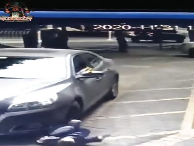 Crushed by a car in China
