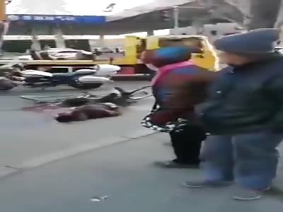 Motorcyclist hit by heavy machinery (aftermath)