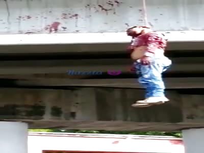 Drug Cartel Hangs Body from City Bridge in Grisly Show of Force