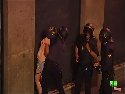 Spanish national police abusing a girl in eviction