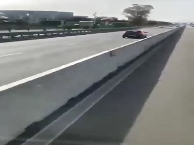 Car in the wrong direction on the highway